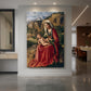 Canvas art print of a Renaissance scene of the Madonna and child set within a natural landscape displayed as a statement piece in a spacious interior.