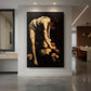 Canvas art print of a Baroque scene of David holding Goliath's head in dramatic shadow displayed as a statement piece in a spacious interior.