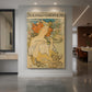 Canvas art print of an Art Nouveau poster of a woman with ornate details and publication typography displayed as a statement piece in a spacious interior.