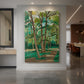 Canvas art print of a fauvist landscape of a tree-lined crossroads with vivid greens and warm tones displayed as a statement piece in a spacious interior.