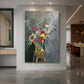 Canvas art print of a fauvist still life of mixed flowers with vibrant color and loose brushwork displayed as a statement piece in a spacious interior.