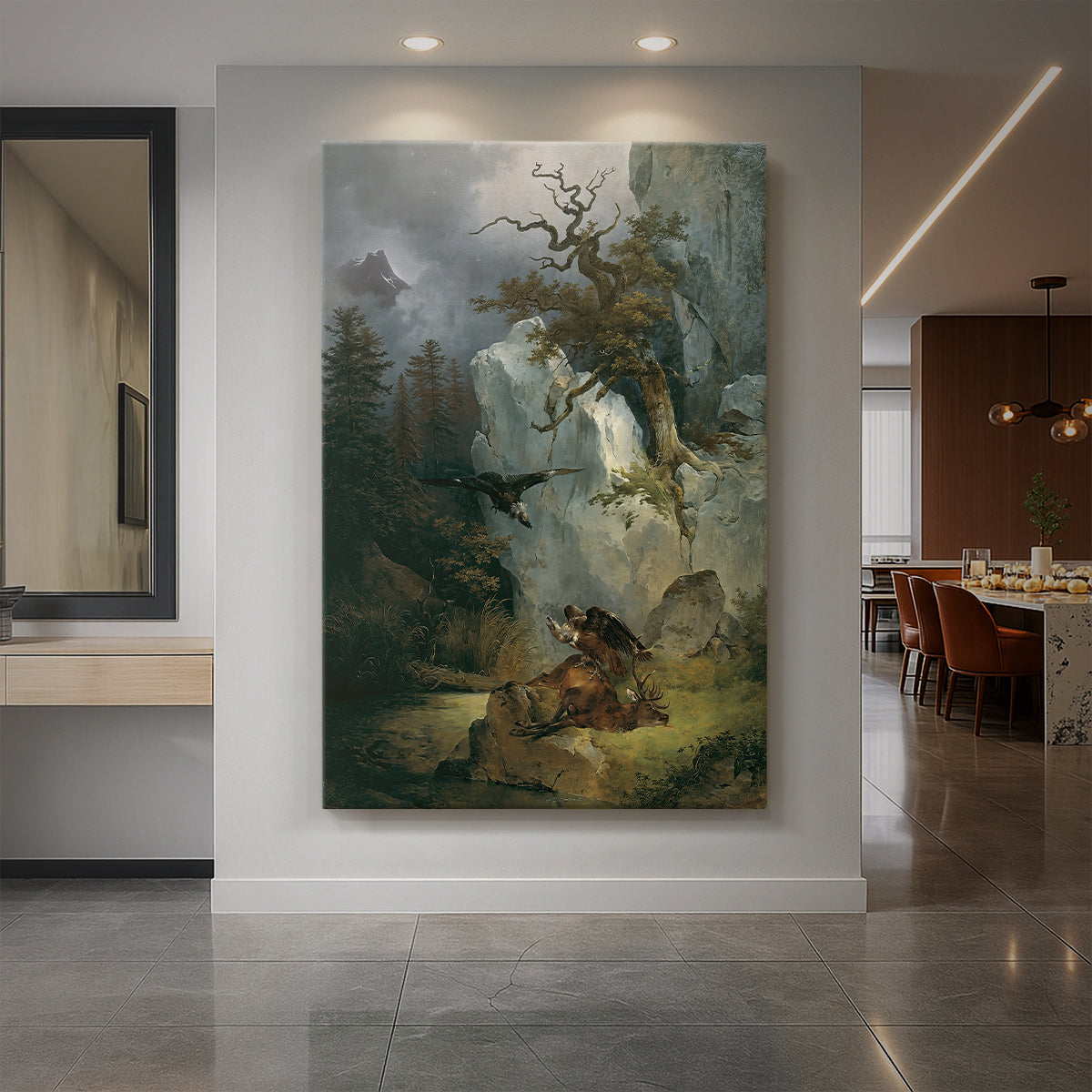 Canvas art print of a realistic wildlife scene of a vulture perched on a deer in a rugged landscape displayed as a statement piece in a spacious interior.
