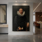 Canvas art print of a Baroque portrait of a man in dark attire with refined posture and soft lighting displayed as a statement piece in a spacious interior.