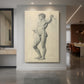 Canvas art print of a figure study of a standing male nude with light, expressive linework displayed as a statement piece in a spacious interior.