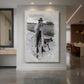 Canvas art print of an Art Nouveau scene of a figure in dramatic costume with expressive pose displayed as a statement piece in a spacious interior.
