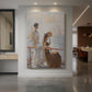 Canvas art print of an impressionist coastal scene of figures by the water in bright light displayed as a statement piece in a spacious interior.