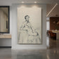 Canvas art print of a portrait study of a man with light sketch detail and vintage style displayed as a statement piece in a spacious interior.