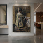 Canvas art print of a realistic interior scene of figures gathered around a table in warm light displayed as a statement piece in a spacious interior.