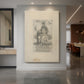 Canvas art print of a monochrome engraving of a prophet figure with detailed contours and text displayed as a statement piece in a spacious interior.