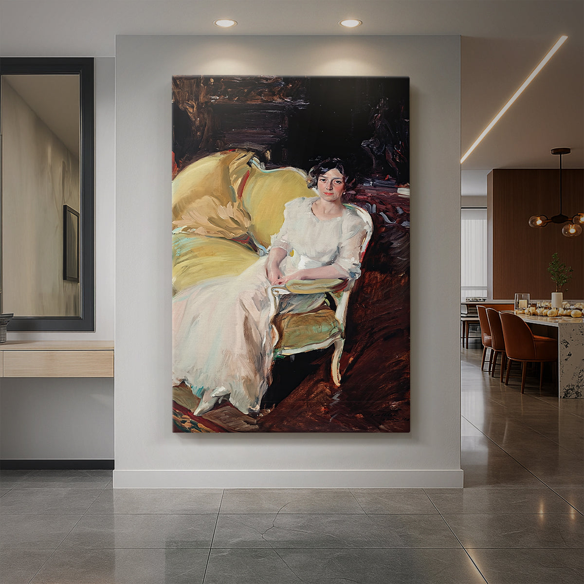 Canvas art print of an impressionist interior portrait of a seated woman with soft light and texture displayed as a statement piece in a spacious interior.