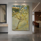 Canvas art print of an expressive scene of a flowering tree with light tones and textured strokes displayed as a statement piece in a spacious interior.