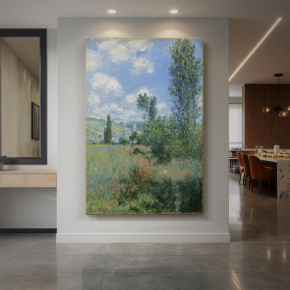 Canvas art print of an impressionist landscape of a village with soft light and natural tones displayed as a statement piece in a spacious interior.