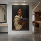Canvas art print of a portrait of a young woman holding a tambourine with soft light displayed as a statement piece in a spacious interior.