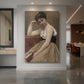 Canvas art print of a realistic scene of a woman pausing while reading in soft light displayed as a statement piece in a spacious interior.