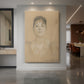 Canvas art print of a portrait study of a woman with delicate features and soft pencil shading displayed as a statement piece in a spacious interior.
