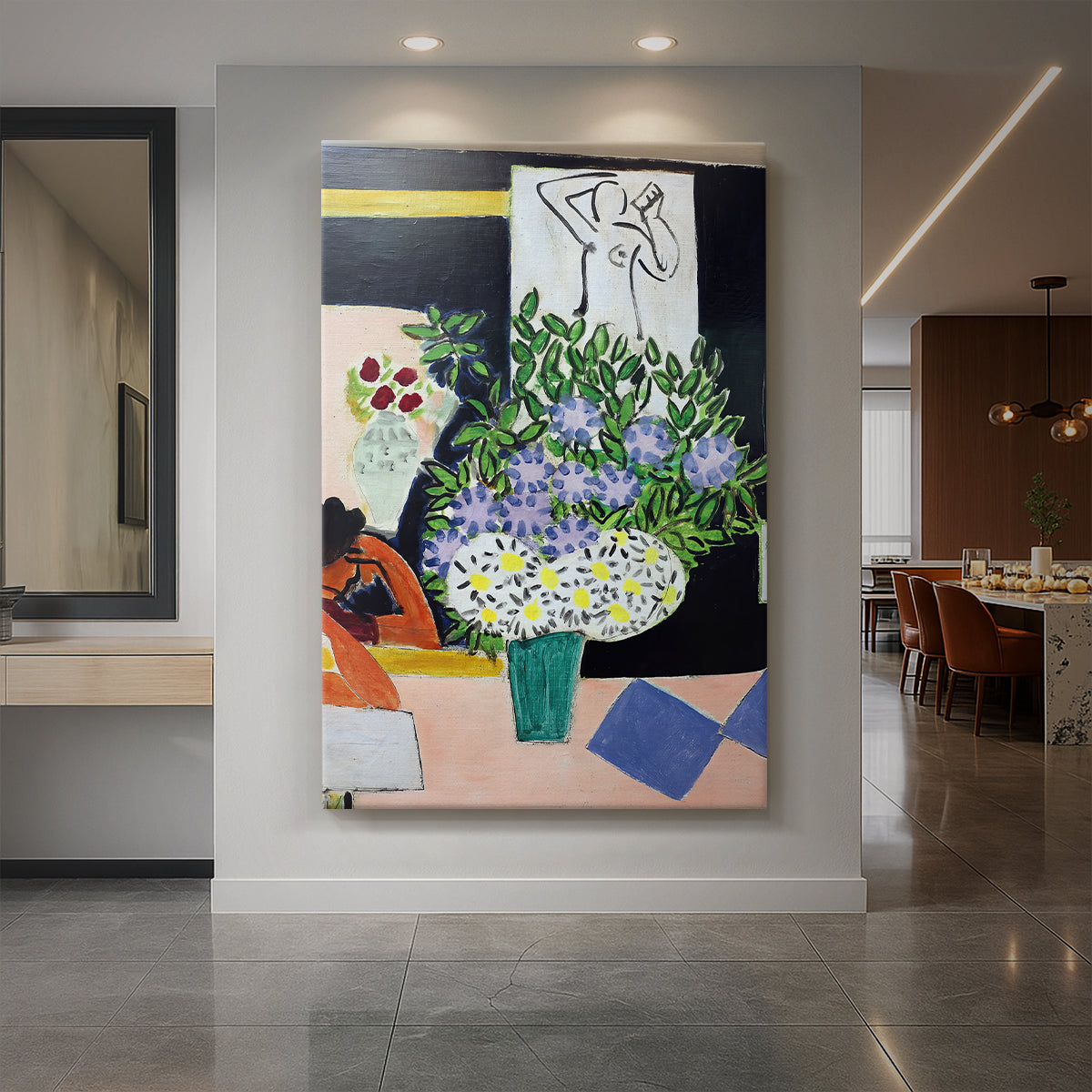 Canvas art print of a fauvist scene of a figure reading against a deep black background displayed as a statement piece in a spacious interior.