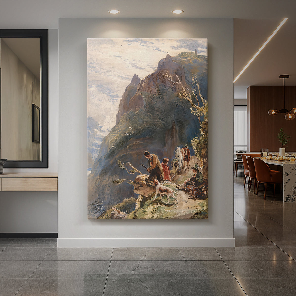 Canvas art print of a mountain landscape with hunters and animals in rugged terrain displayed as a statement piece in a spacious interior.