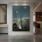 Canvas art print of a dreamlike naïve-style scene of masked figures in a moonlit forest clearing displayed as a statement piece in a spacious interior.