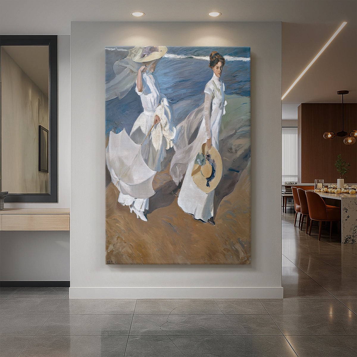 Canvas art print of an impressionist beach scene of women walking along the shore in bright light displayed as a statement piece in a spacious interior.