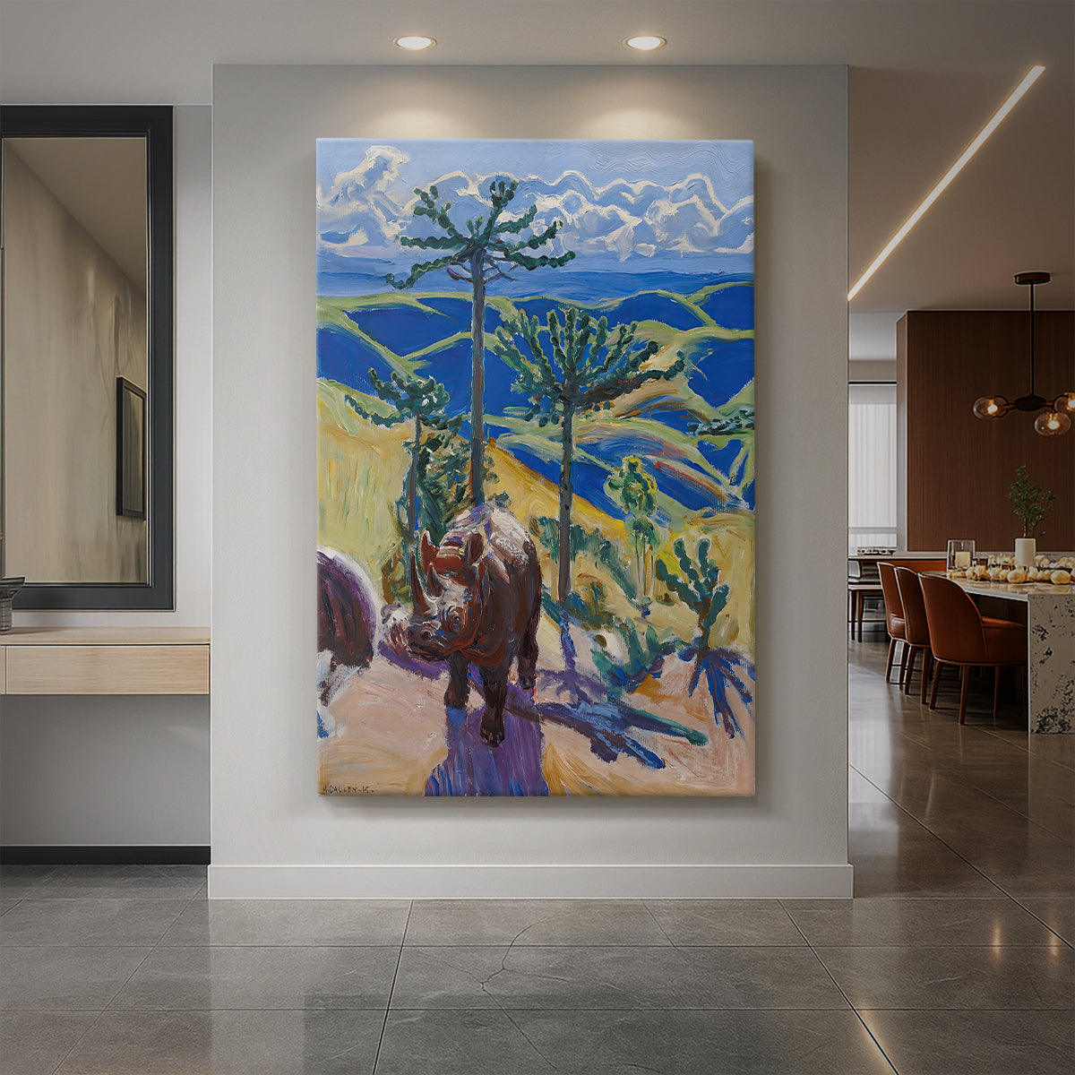 Canvas art print of an expressive scene of a rhinoceros among tall trees in a vivid landscape displayed as a statement piece in a spacious interior.