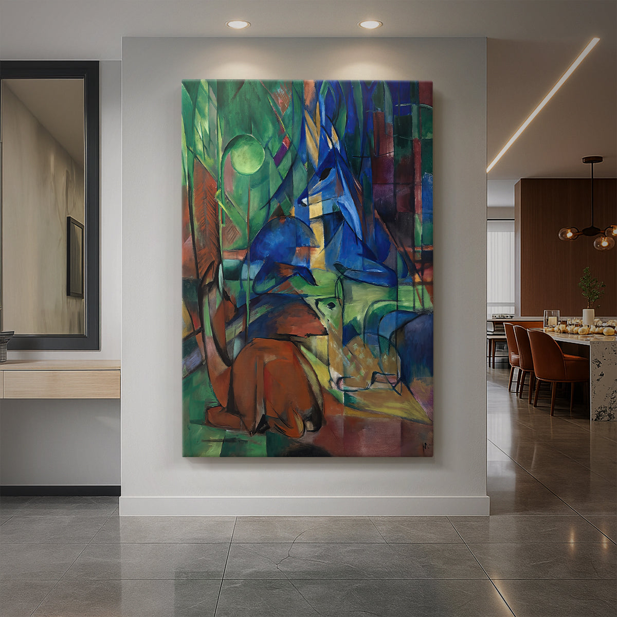 Canvas art print of an expressionist woodland scene with deer and fractured color planes displayed as a statement piece in a spacious interior.