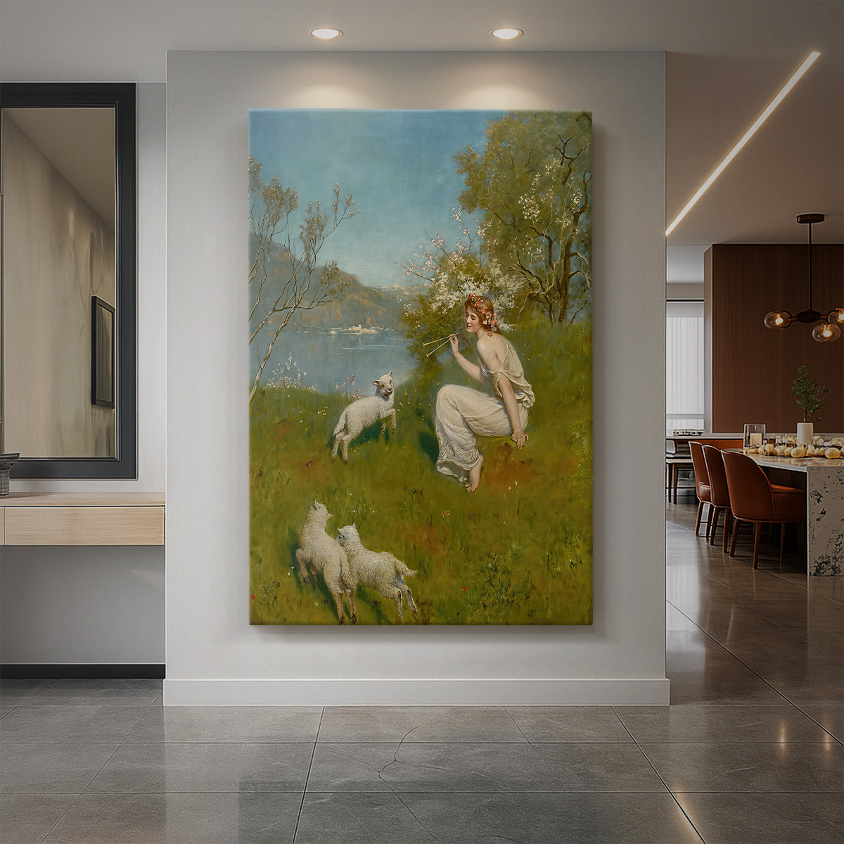 Canvas art print of a woodland scene of a young woman relaxing in a field with lambs displayed as a statement piece in a spacious interior.