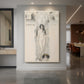 Canvas art print of a figure study of a standing form with delicate line and minimal detail displayed as a statement piece in a spacious interior.