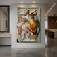 Canvas art print of a Renaissance figure of a seated woman with muscular form and dynamic pose displayed as a statement piece in a spacious interior.