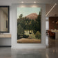 Canvas art print of a naïve-style landscape with trees, buildings, and soft sky tones displayed as a statement piece in a spacious interior.