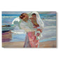 Canvas art print portraying figures standing on beach drying off after swimming in sunlight, set against a white background