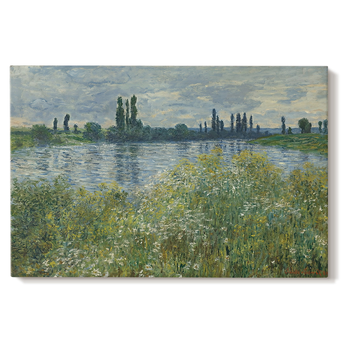 Canvas art print portraying a riverbank landscape with water, trees, and distant village buildings, set against a white background