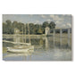 Canvas art print portraying a bridge spanning river with sailboats and reflections in water, set against a white background