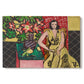 Canvas art print portraying a seated woman beside a vase of amaryllis in a richly patterned interior, set against a white background