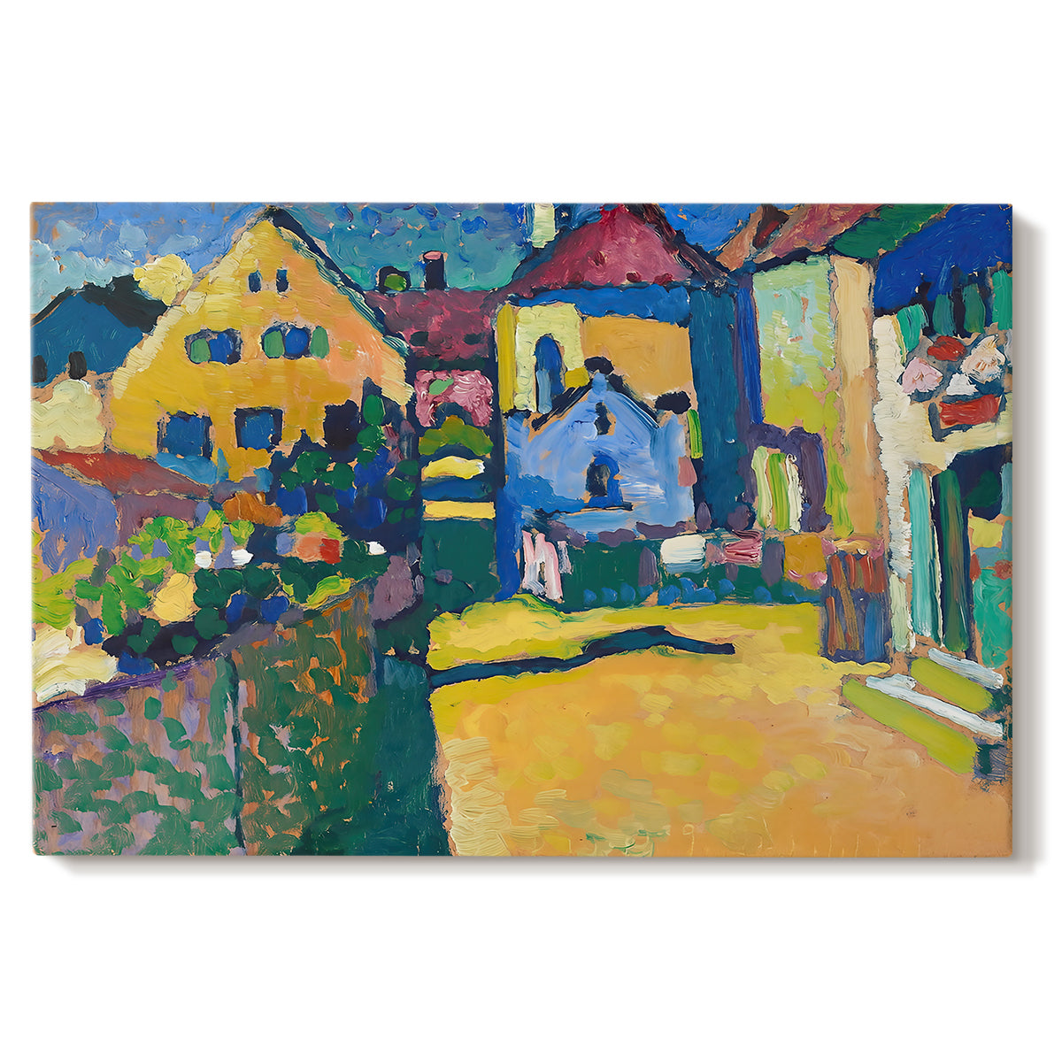 Canvas art print portraying a village street with colorful houses and trees lining a narrow road, set against a white background