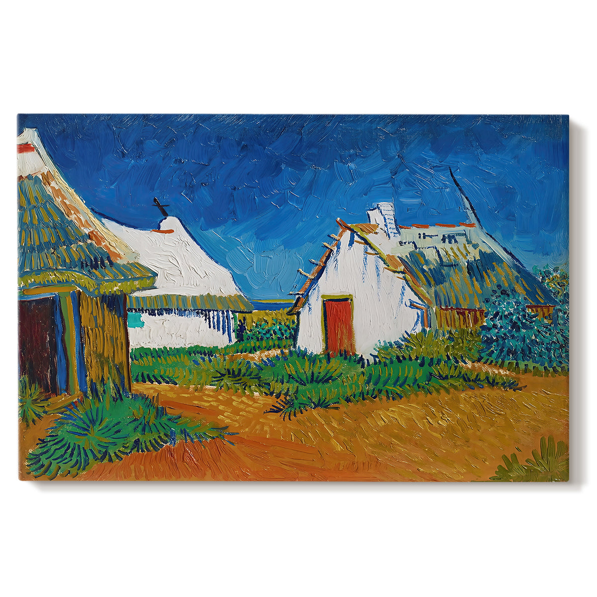 Canvas art print portraying white cottages grouped together with bold colors and surrounding landscape, set against a white background