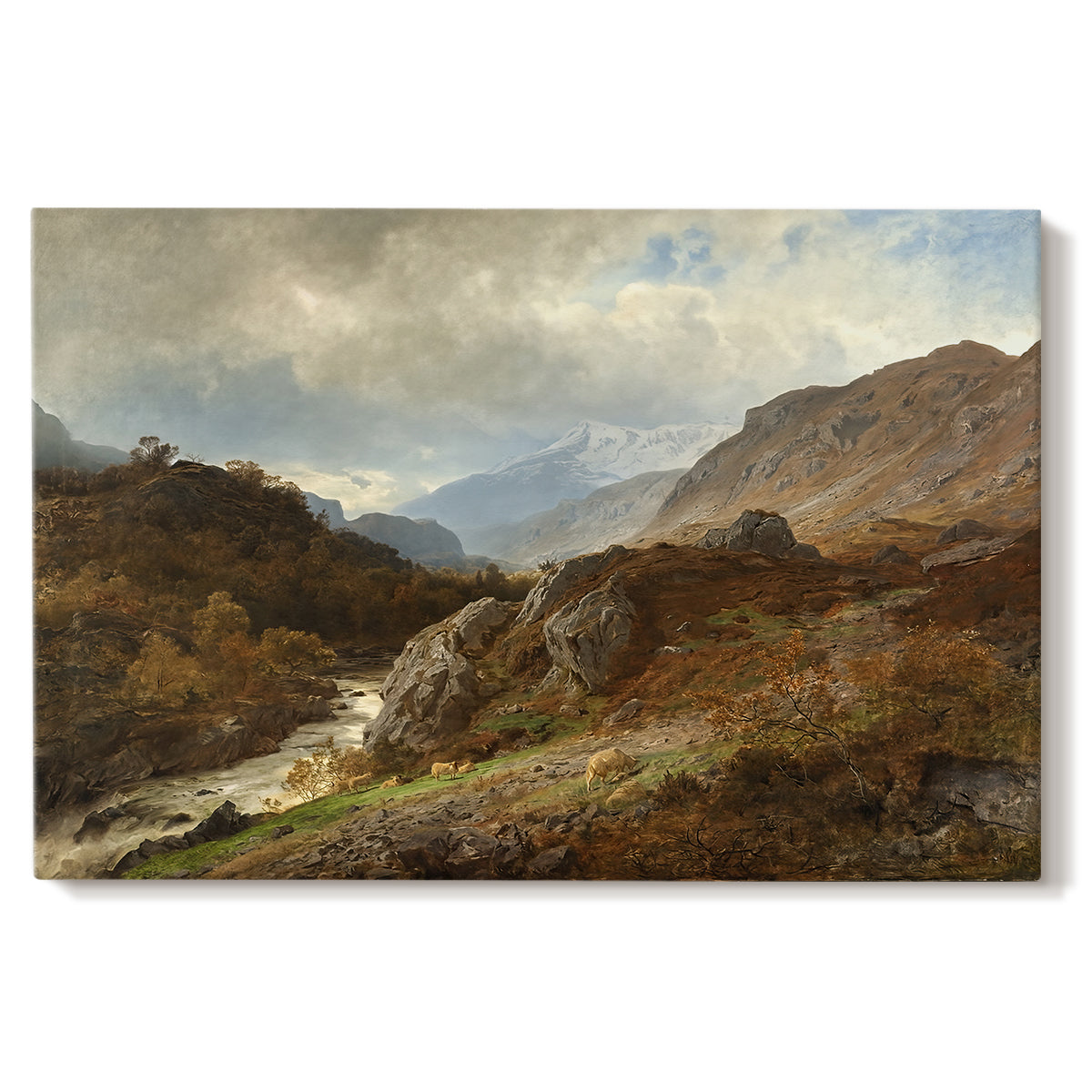 Canvas art print portraying a rugged mountain terrain with valley and distant peaks under open sky, set against a white background
