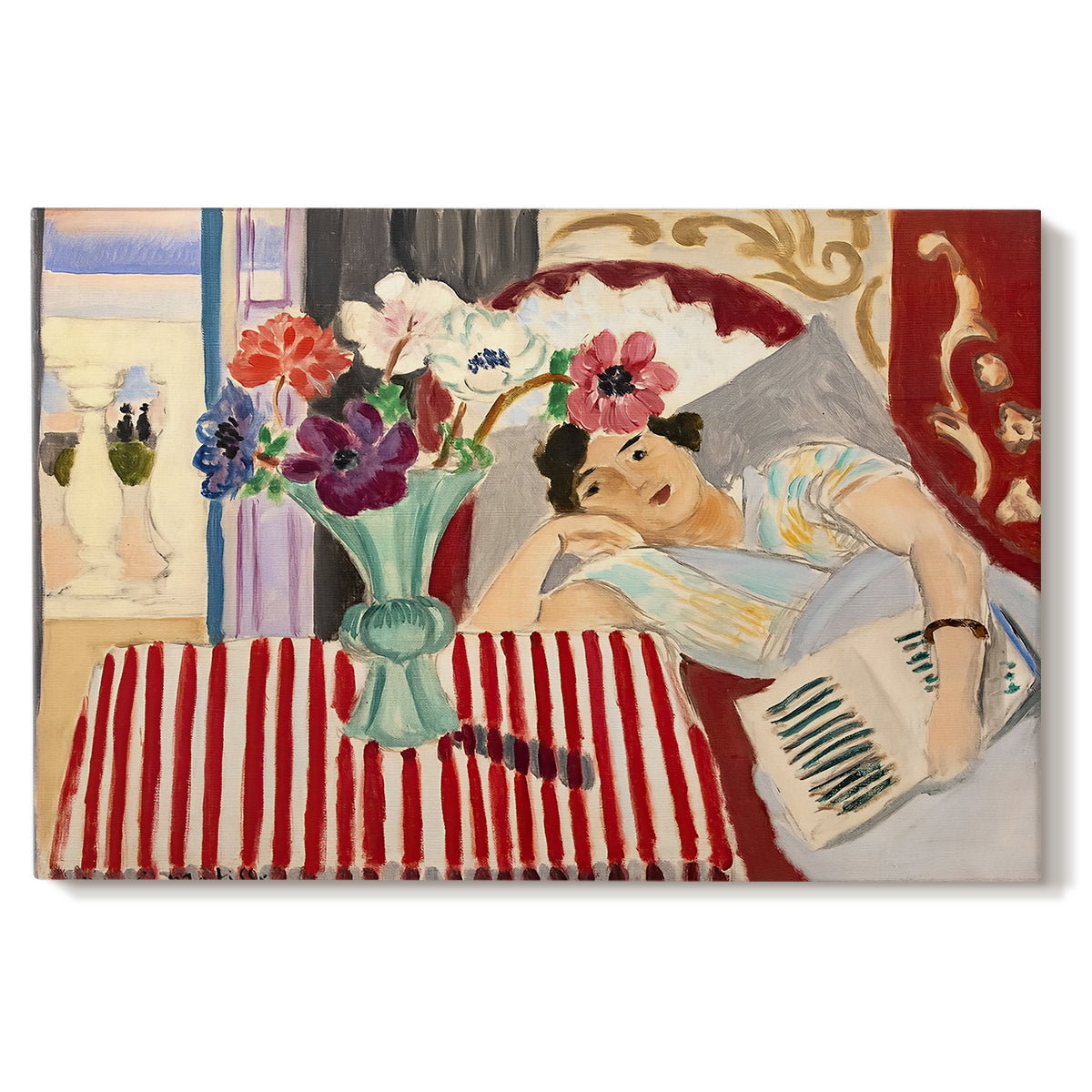 Canvas art print portraying a seated woman beside vase of anemones in richly patterned interior, set against a white background