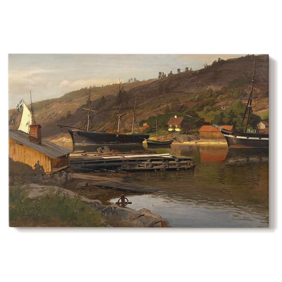 Canvas art print portraying a small harbor with boats docked along shoreline near buildings, set against a white background