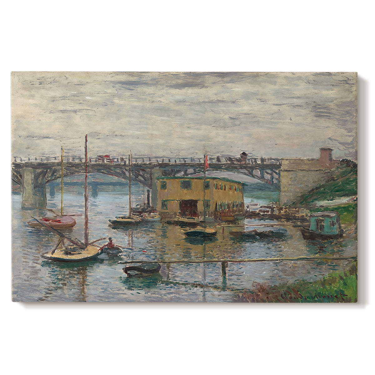 Canvas art print portraying a bridge crossing river under gray sky with muted reflections, set against a white background