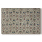 Canvas art print portraying a repeating floral pattern with symmetrical layout across elongated textile surface, set against a white background