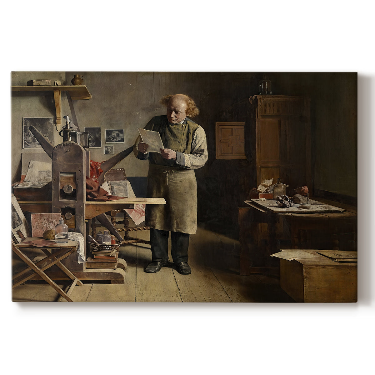 Canvas art print portraying a man working at printing table inside detailed workshop interior, set against a white background