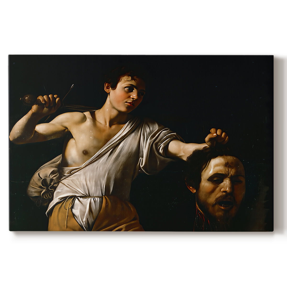 Canvas art print portraying a young David holding the severed head of Goliath against a dark background, set against a white background