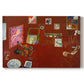 Canvas art print portraying a red studio interior with furniture and artworks, set against a white background