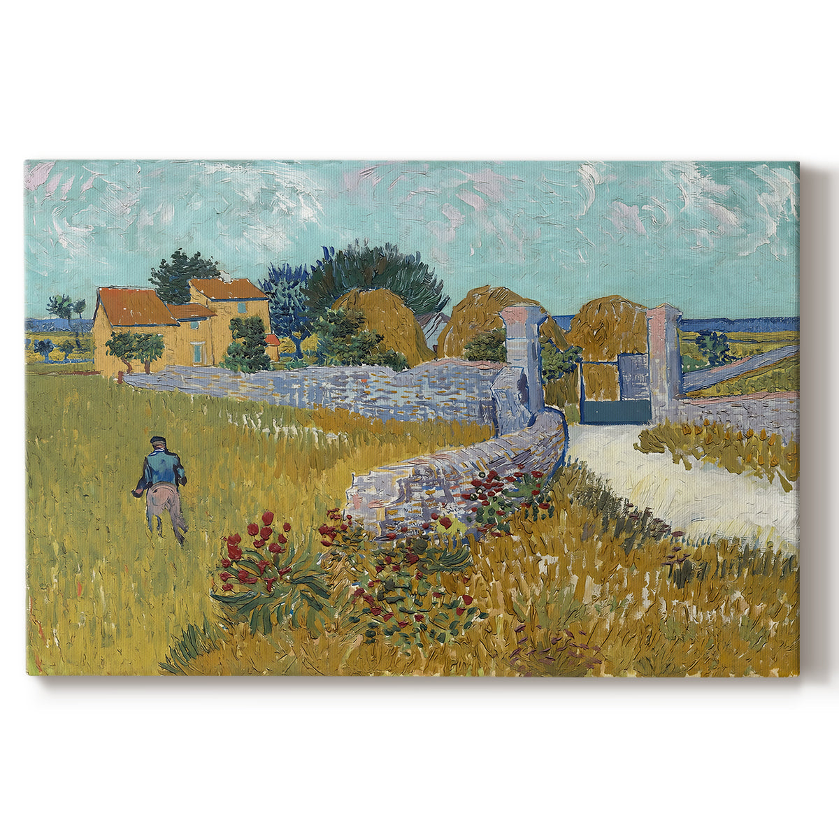 Canvas art print portraying a small farmhouse surrounded by yellow field and trees under blue sky, set against a white background