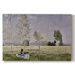 Canvas art print portraying a woman seated in grassy field beneath tree in bright summer landscape, set against a white background