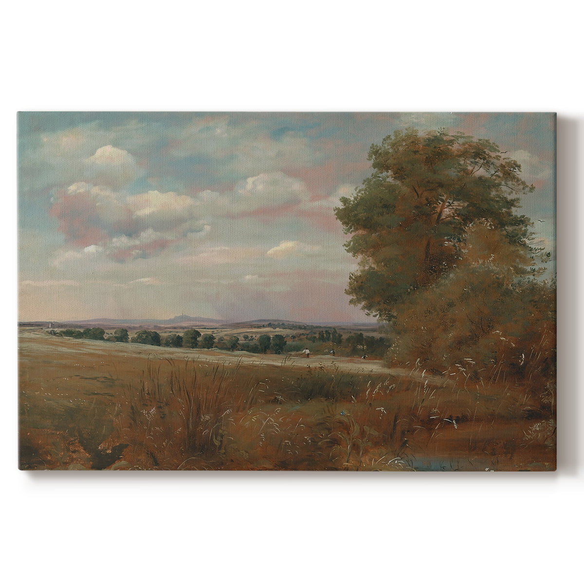 Canvas art print portraying a wide landscape with distant buildings across terrain, set against a white background
