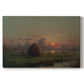 Canvas art print portraying a haystack in field under warm sunset sky, set against a white background