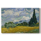 Canvas art print portraying a golden wheat field with tall cypress trees under swirling sky, set against a white background
