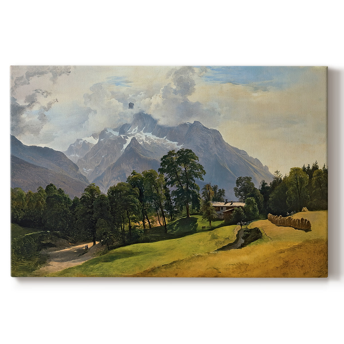 Canvas art print portraying an alpine mountain landscape with towering peaks and valley below, set against a white background