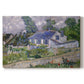 Canvas art print portraying village houses clustered along road with surrounding greenery under open sky, set against a white background